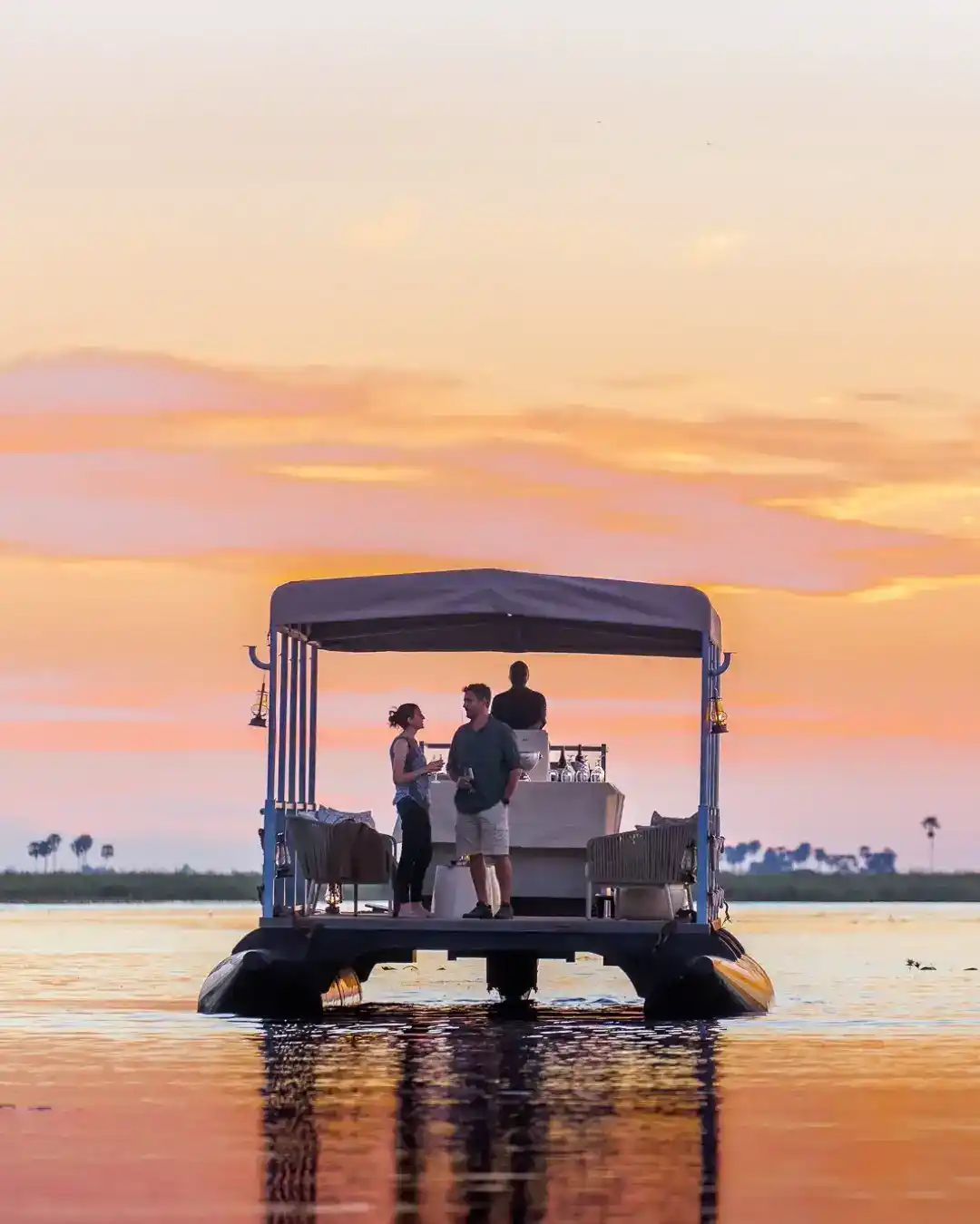 Zambezi River sunset cruise Victoria Falls Zimbabwe hippos elephants wildlife viewing
