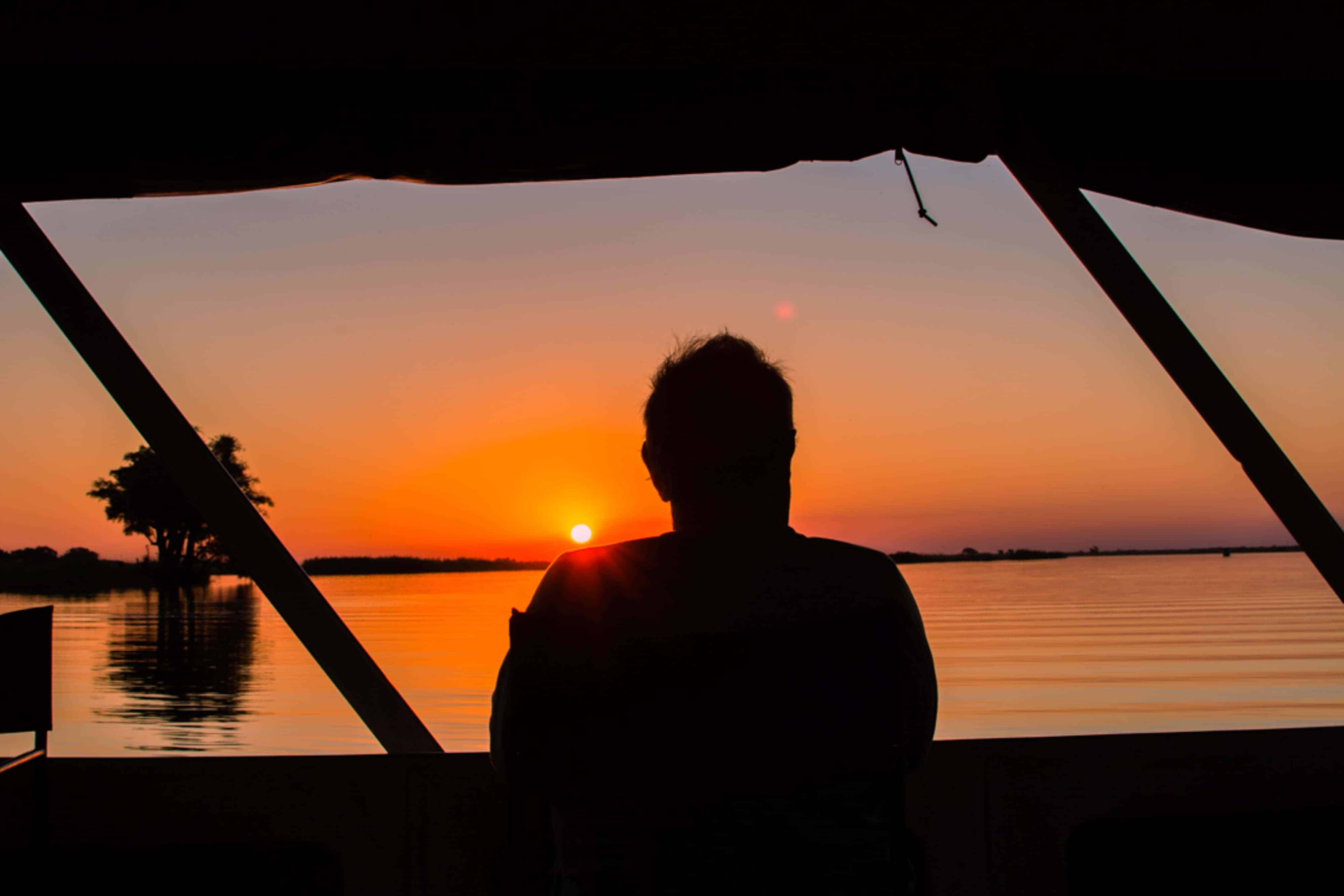 Chobe River boat safari cruise hippos crocodiles Botswana wildlife